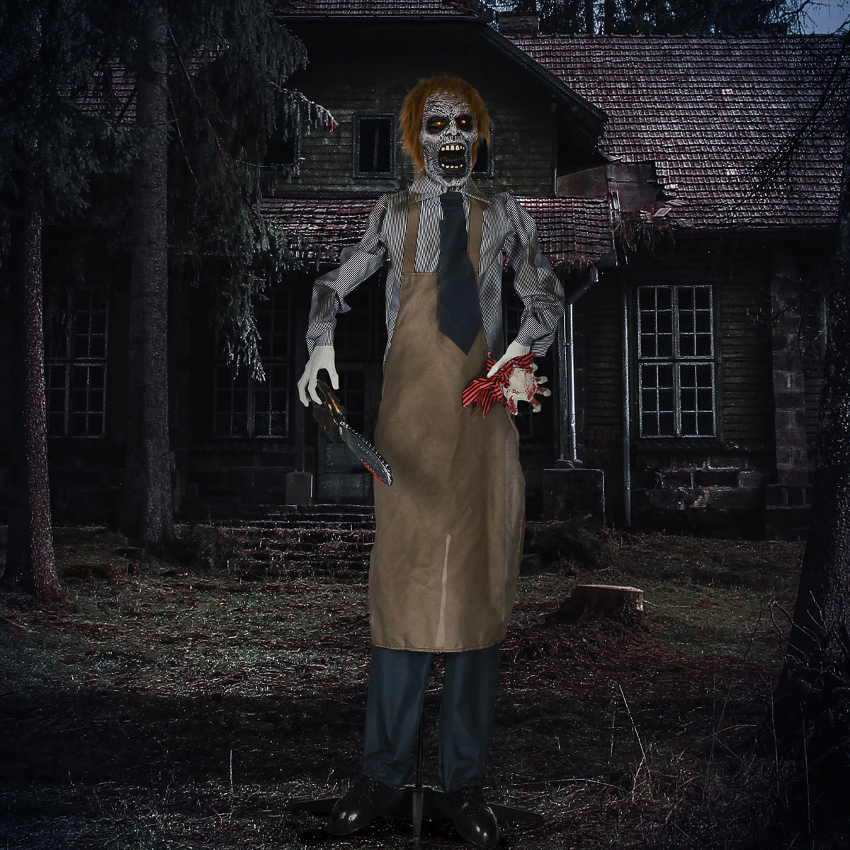 Shaking body mechanism on an animated chainsaw Halloween figure