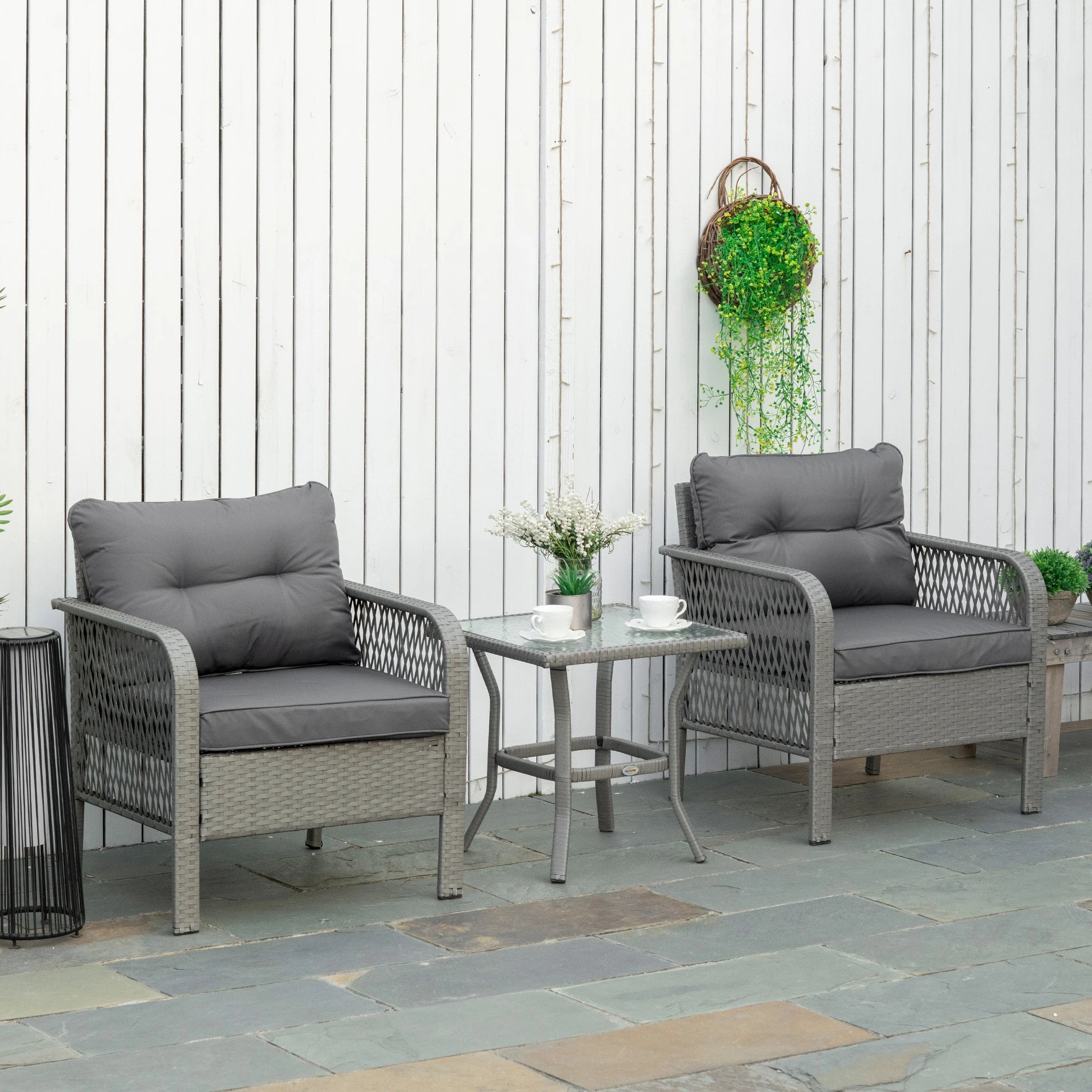 3-Piece Rattan Bistro Set with Tempered Glass Table and Cushioned Armchairs