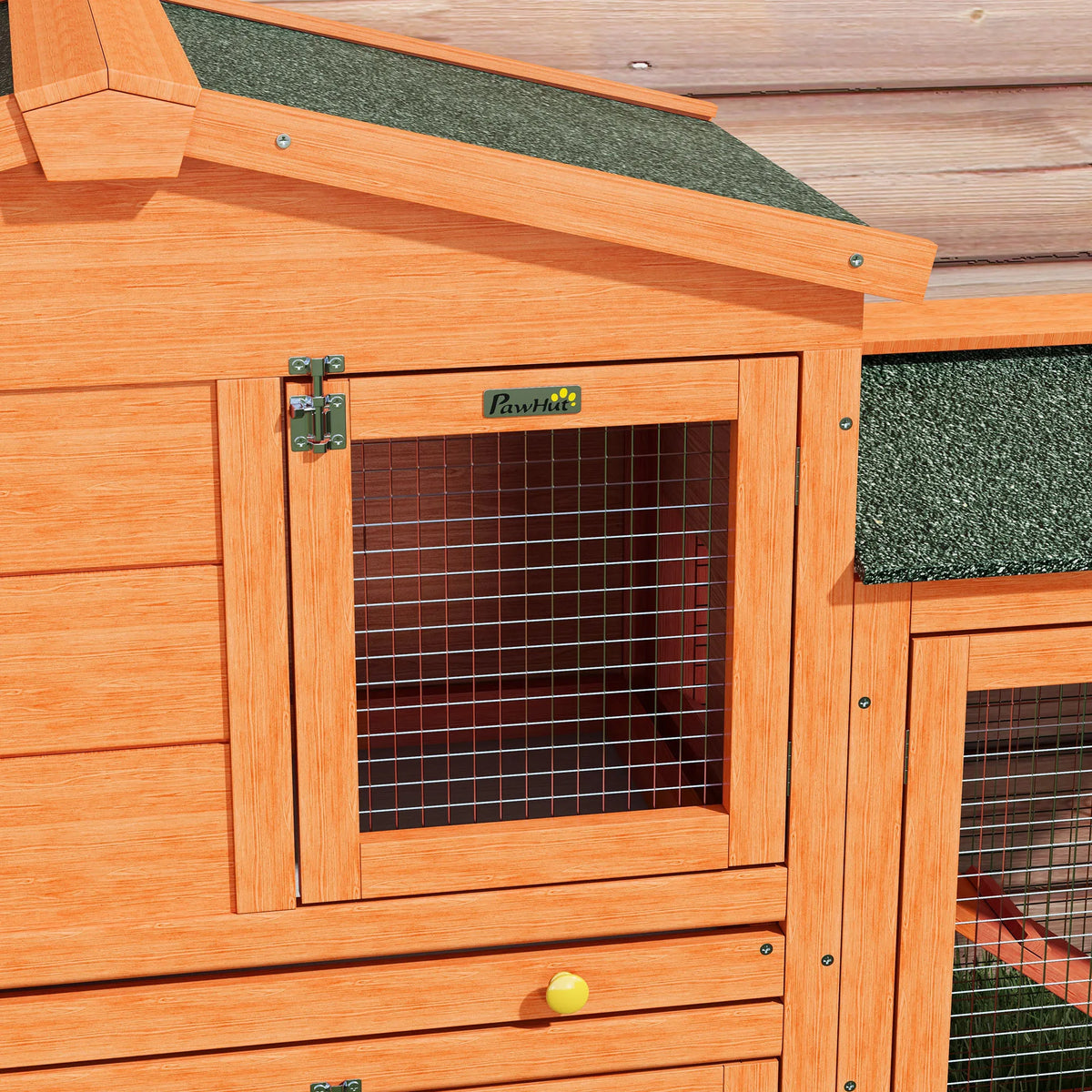 Slide out cleaning tray pulled from the base of a rabbit hutch