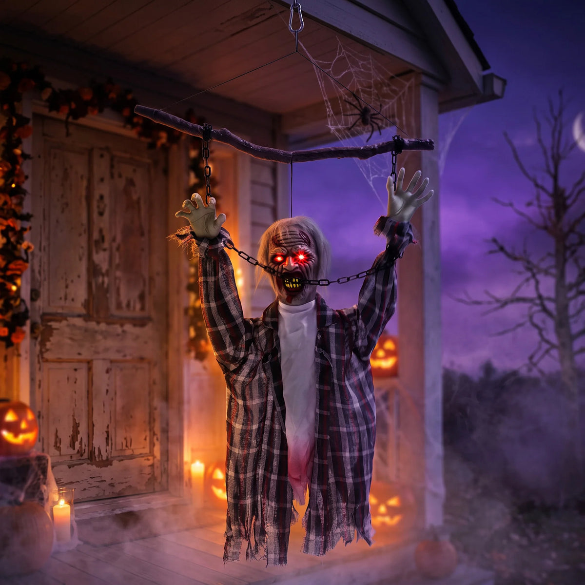 Decayed plaid jacket detail on an animated zombie decoration