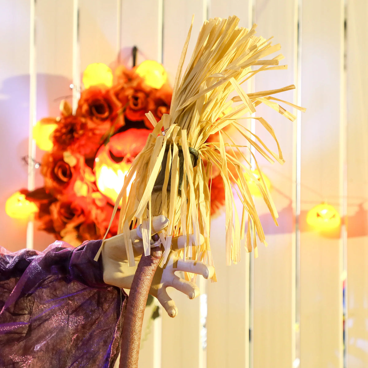183cm purple witch prop shown in a hallway