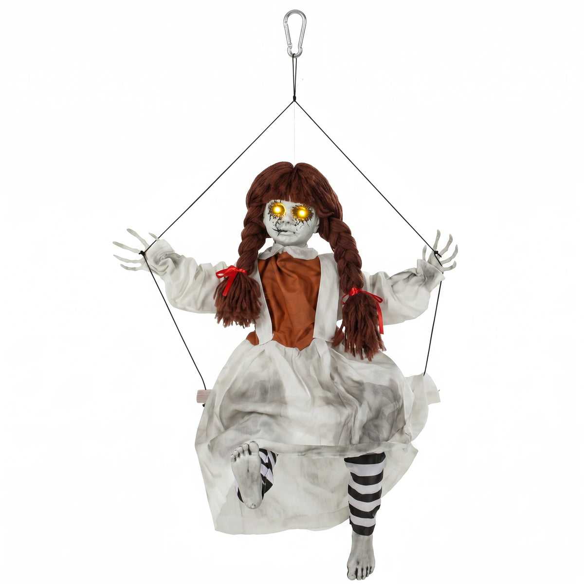 Hanging Halloween decoration of a creepy girl on a swing