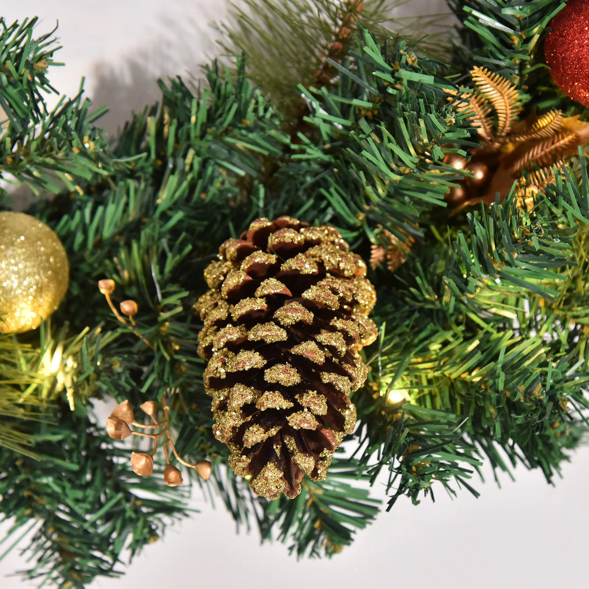 Pre-Lit Artificial Christmas Wreath with Holly, Pine Cones and 20 LED Lights, 60cm
