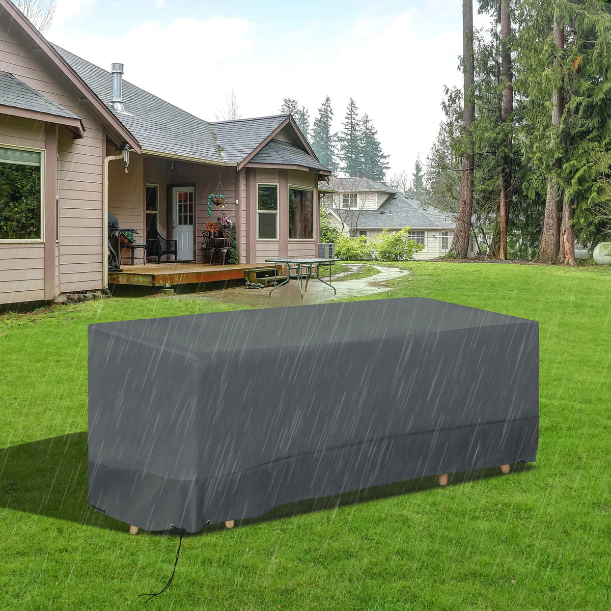 Light grey waterproof garden furniture cover with pull cord fastening