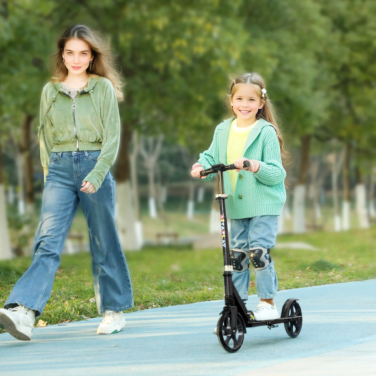 Pink foldable kids kick scooter with adjustable handlebar